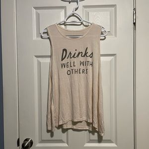 “Drinks well with others” tank top. Size medium/ large